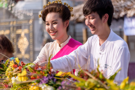 CHIANG MAI, THAILAND - MAY 22 : People worshiping offering flowers attended a ceremony to worship...