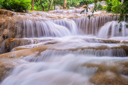 Mae Kae 2 (Kaofu) waterfall the Most Famous in Lampang, Thailand. Beautiful silky waterfall flow through stones. Mountain stream running over rocks.の写真素材