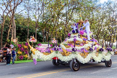 CHIANG MAI,THAILAND-FEBRUARY 02, 2019 :Unidentified peoples are in parade with fresh flowers decorate car in annual 43 th Chiang Mai Flower Festival.のeditorial素材