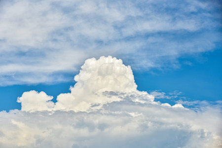 Beautiful white clouds on blue sky background. Puffy fluffy white clouds blue sky.
