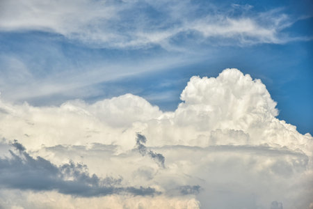 Beautiful white clouds on blue sky background. Puffy fluffy white clouds blue sky.