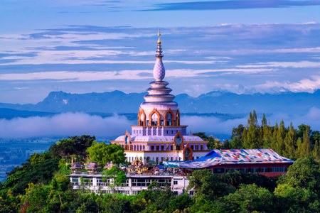 Beautiful pagoda of Tha Ton Temple set amid green mountains in Chiang Mai,Thailand. Place for...