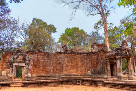 Ta Prohm temple that is deteriorated over time located at Angkor Thom, Siem Reap, Cambodia. Ta Prohm temple is a ancient Khmer architectureの写真素材