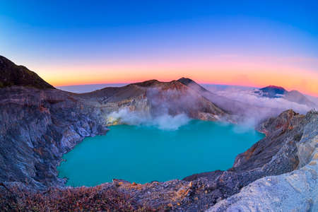 Beautiful view of Kawah Ijen lake and volcano early morning at East Java, Indonesia. The most famous tourist attraction in Indonesia.の写真素材