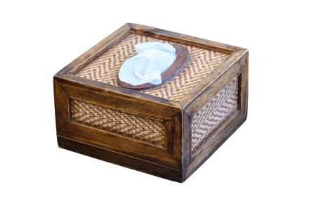 paper napkin in wooden box isolated on white background with clipping pathの写真素材