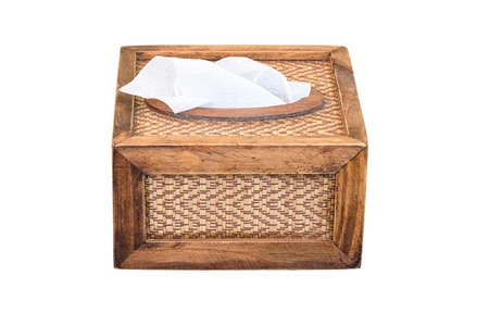 paper napkin in wooden box isolated on white background with clipping pathの写真素材