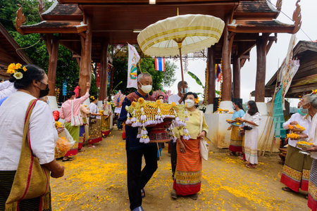 CHIANG MAI, THAILAND - NOVEMBER 14, 2021:  Kathin ceremony for belief and merit in Buddhism of Thai at Yang Luang temple in Mae Chaem District, Chiang Mai, Thailandのeditorial素材