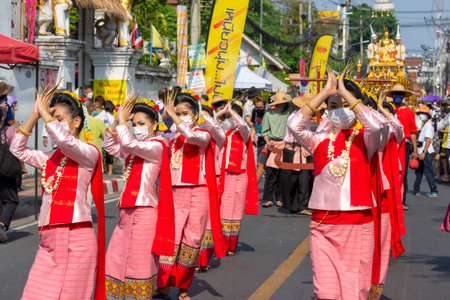 CHIANG MAI, THAILAND - APRIL 13, 2022: The traditional bathing of the Buddha Phra Singh parade and...