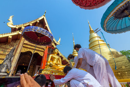 CHIANG MAI, THAILAND - APRIL 13, 2022: Moved Buddha Phra Singh of Phra Singh temple to the parade cars to pour water around the city in Chiang Mai, Thailand. Chiang Mai Songkran festival.のeditorial素材