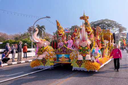 CHIANG MAI, THAILAND - FEBRUARY 04 , 2023  : A car decorated with fresh flowers in the parade of the...
