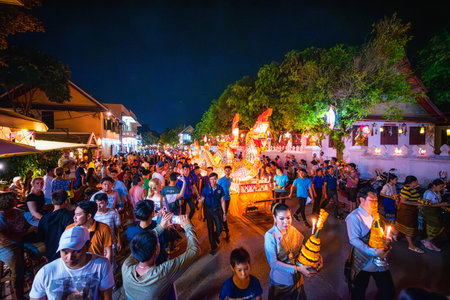 LUANG PRABANG, LAOS - OCTOBER 14, 2019: Parade the lamp for the lantern festival at the end of...