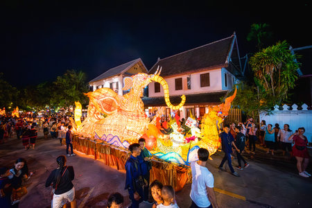 LUANG PRABANG, LAOS - OCTOBER 14, 2019: Parade the lamp for the lantern festival at the end of Buddhist lent day at Luang Prabang, Laos.のeditorial素材