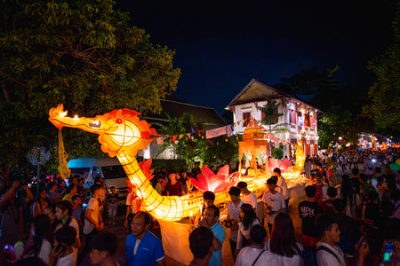 LUANG PRABANG, LAOS - OCTOBER 14, 2019: Parade the lamp for the lantern festival at the end of...