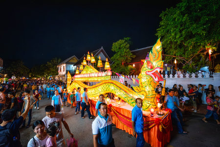 LUANG PRABANG, LAOS - OCTOBER 14, 2019: Parade the lamp for the lantern festival at the end of...