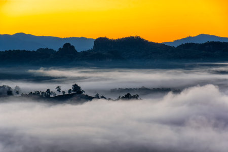 Morning mist viewpoint Baan Jabo, the most favourite place for tourist in Mae Hong Son province Thailand. Baan Jabo one of the most amazing mist in Thailand.の写真素材