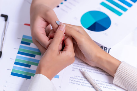 Group Asian businesses join hands for working job success after meeting in the office. Teamwork Success. Business Conceptの写真素材