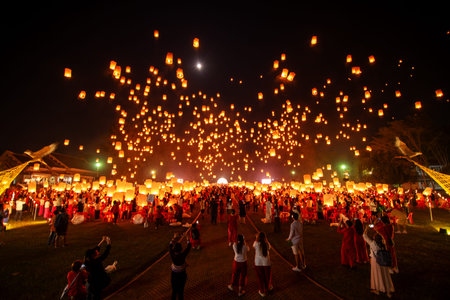 Fire Lanterns Floating up into the sky at night at Loi Krathong Festival Travel Destinations Of...