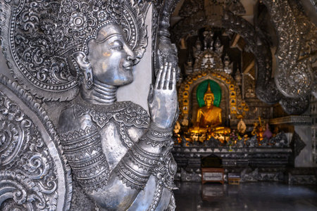 The principal Buddha image in the silver chapel of Sri Suphan temple in Chiang mai, northern Thailand. Sri Suphan temple it the first chapel silver temple in the worldの写真素材