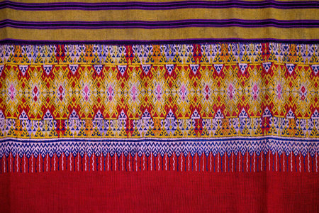 Close up traditional Thai woven fabric patterns beautiful background.  detail pattern farabic...