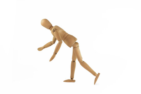 Wooden figure waver on white background.の写真素材
