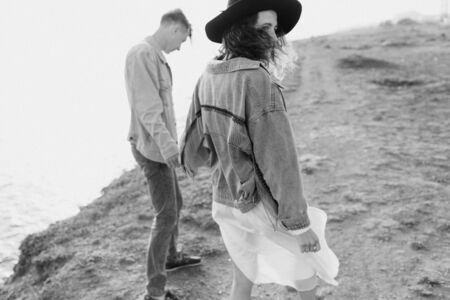 Love couple. Beautiful man and woman in nature. Black and white photo.の写真素材