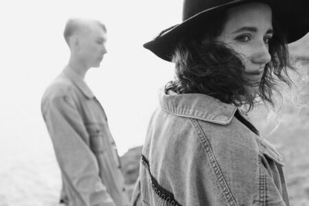 Love couple. Beautiful man and woman in nature. Black and white photo.の写真素材