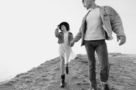 Love couple. Beautiful man and woman in nature. Black and white photo.の写真素材