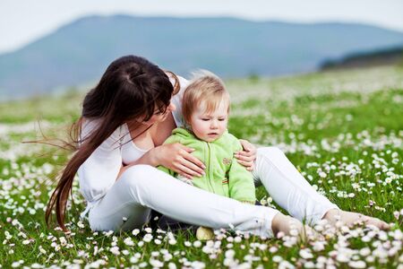 Woman with a child in nature.の写真素材