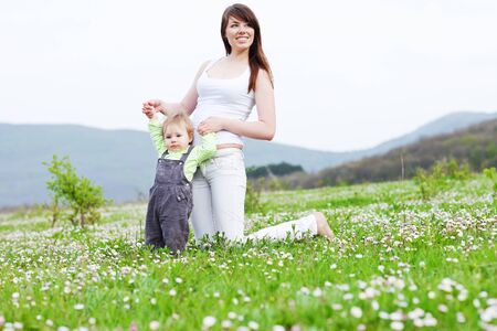 Woman with a child in nature.の写真素材