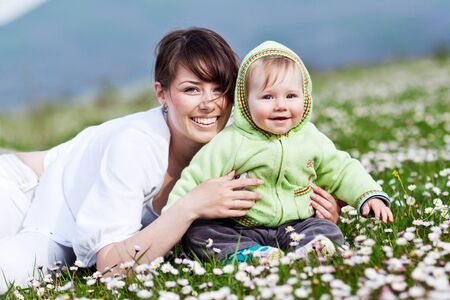 Woman with a child in nature.の写真素材