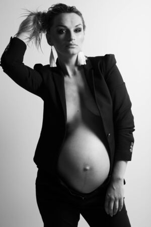 Pregnant woman in sexy city. High quality photo.の写真素材