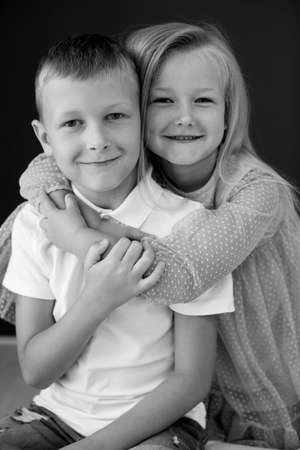 Little boy and little girl. Brother and sister. High quality photo.の写真素材