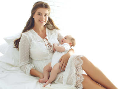 A woman with a baby. Mother and child. High quality photo.