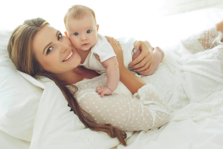 A woman with a baby. Mother and child. High quality photo.