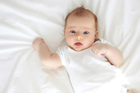 Infant child. The child lies on a blanket.High quality photo.の写真素材