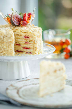 Napoleon cake. Beautiful cake with berries, classic pastries. High quality photo.の写真素材