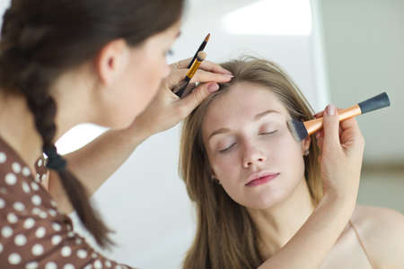 Professional make-up. Makeup is done to a beautiful woman. High quality photo.の写真素材