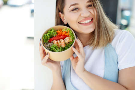 Fat woman on a diet. Proper nutrition. High quality photo.の写真素材