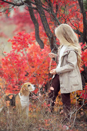 A child in nature with a dog. High quality photo.の写真素材