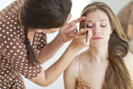 Professional make-up. Makeup is done to a beautiful woman. High quality photo.の写真素材