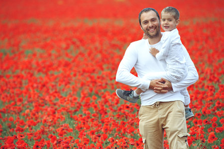 Son and father in nature. The family has fun outdoors. High quality photo.の写真素材
