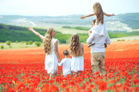 Happy family. Mother, father, children, son and daughter in nature. High quality photo.の写真素材