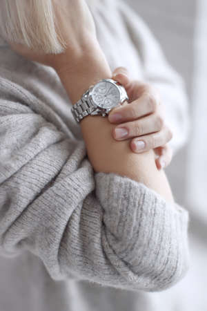 Womens wrist watch on the girls hand. High quality photo.の写真素材