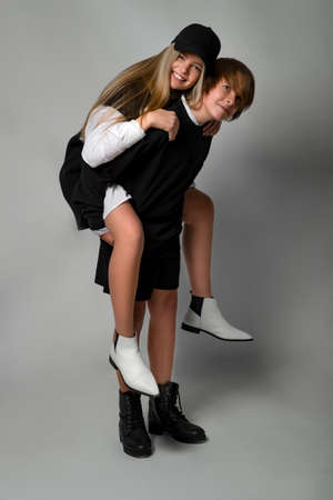 Children style and fashion. Beautiful kids teens in the studio. High quality photo.の写真素材