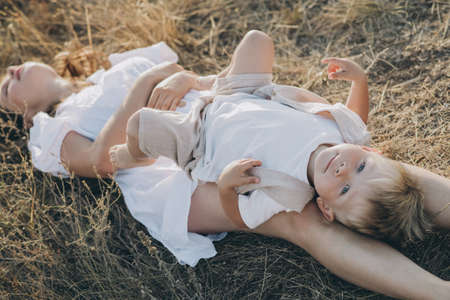 Mom with a child in nature. High quality photoの写真素材
