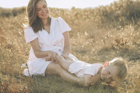 Mom with a child in nature. High quality photoの写真素材