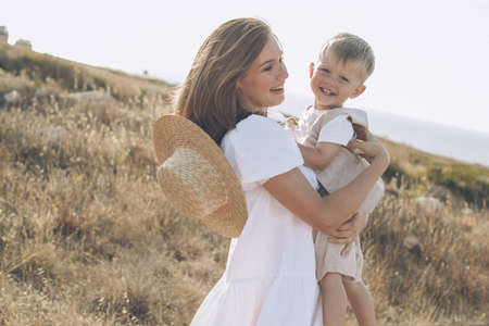 Mom with a child in nature. High quality photoの写真素材