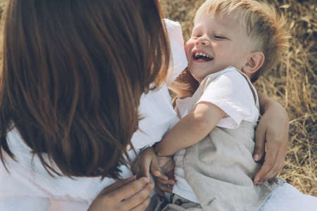 Mom with a child in nature. High quality photoの写真素材