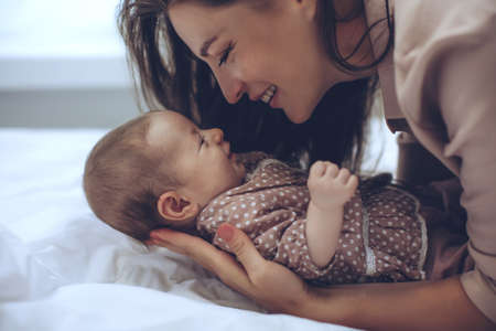 Woman with a baby. Beautiful mother with a baby. High quality photoの写真素材