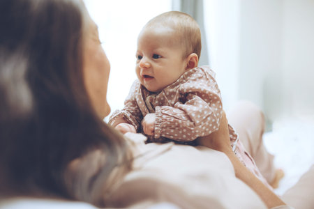 Woman with a baby. Beautiful mother with a baby. High quality photo